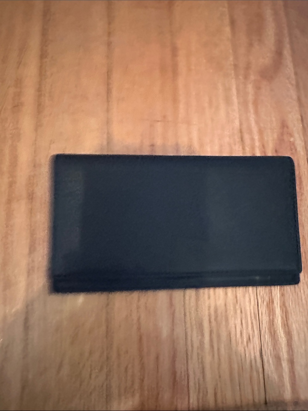 Coach black checkbook cover